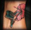 hummingbird and hibiscus flower pic tattoo on feet